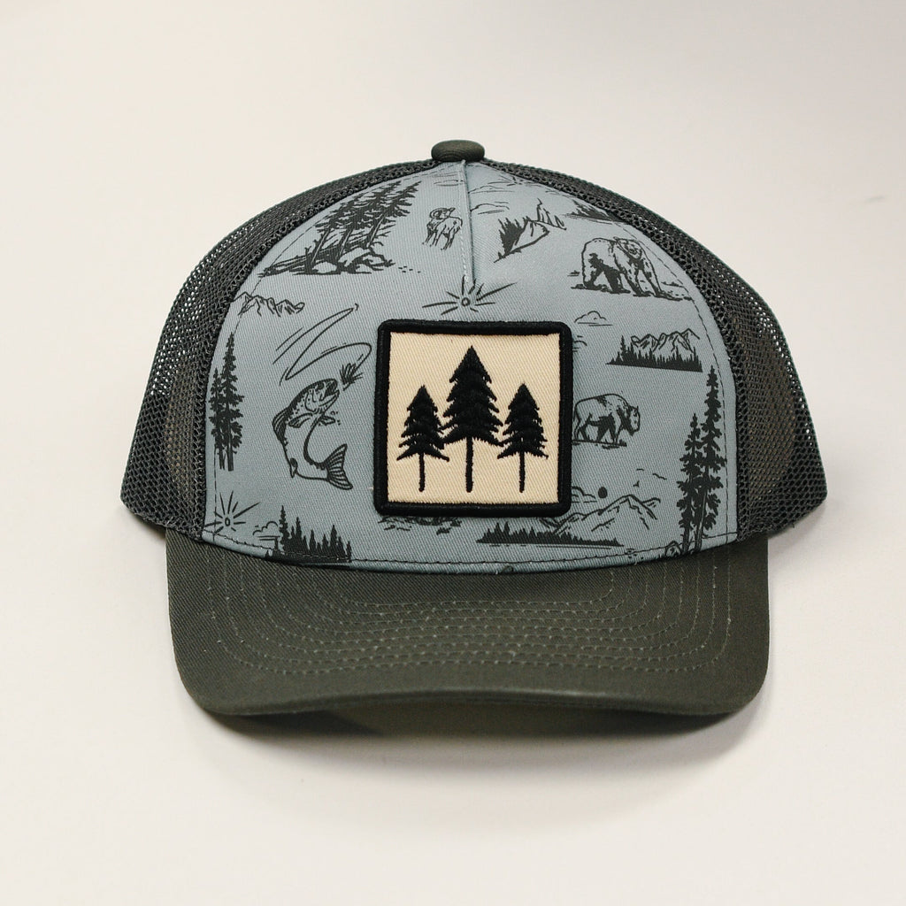 Trucker hat with nature-themed design on a white background