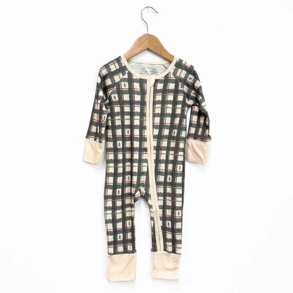 Plaid baby onesie on a hanger against a white background