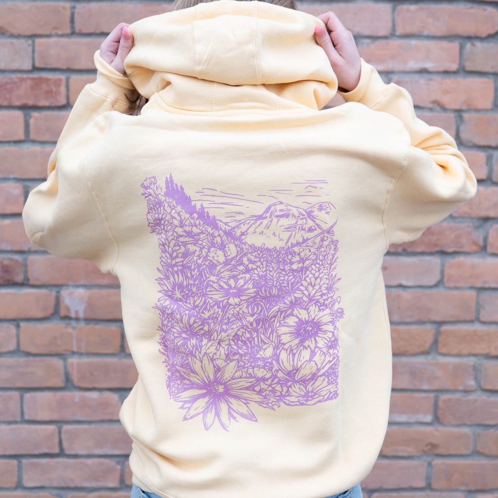 pina colada yellow hoodie with a floral design