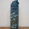 Teal water bottle with floral design 